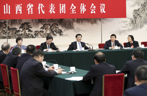 3月12日，中共中央政治局常委、中央書記處書記王滬寧參加十三屆全國人大二次會議山西代表團的審議。新華社記者 丁海濤 攝